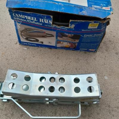 Campbell Hausfeld Inflater / decompressor 115 volt air compressor and a deluxe tire locking chock