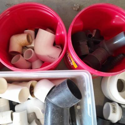 Variety of Plumbing PVC fittings and plastic threaded pipe
