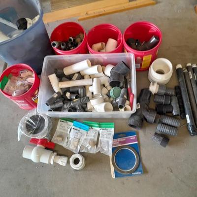 Variety of Plumbing PVC fittings and plastic threaded pipe