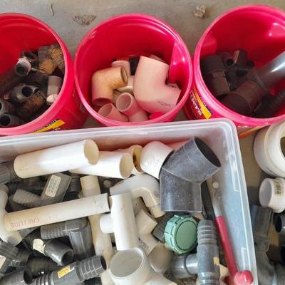 Variety of Plumbing PVC fittings and plastic threaded pipe