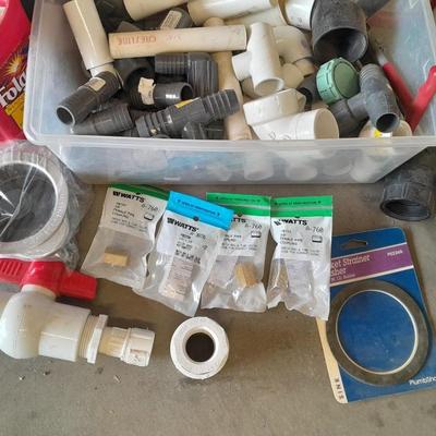 Variety of Plumbing PVC fittings and plastic threaded pipe
