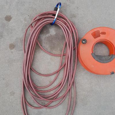 Red extension cord, and Extension cord organizing wheel