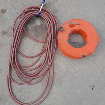 Red extension cord, and Extension cord organizing wheel