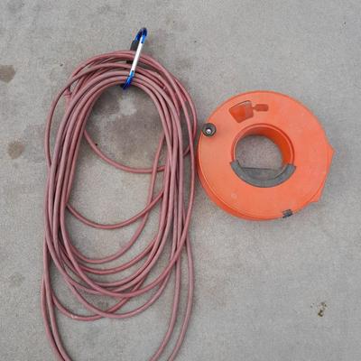 Red extension cord, and Extension cord organizing wheel