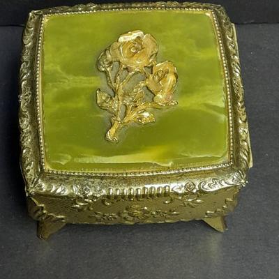 Gold tone jewelry box with rose on lid and vintage hat pins