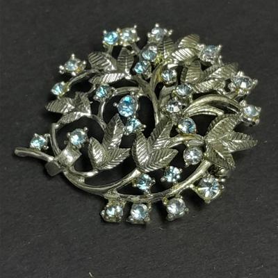 Coro brooch and blue gem clip on earrings with matching pin