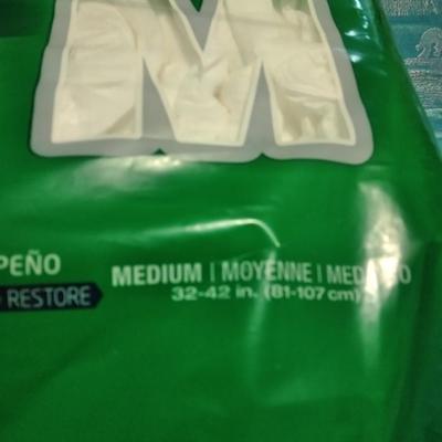 Seat cushion with disposable briefs (opened packages)