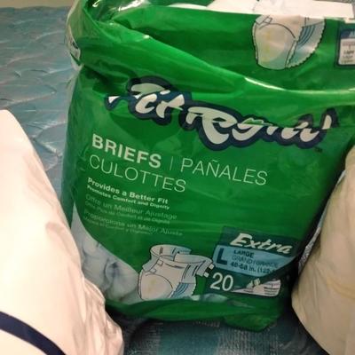 Seat cushion with disposable briefs (opened packages)