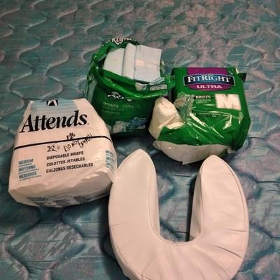 Seat cushion with disposable briefs (opened packages)