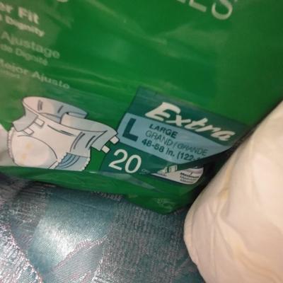 Seat cushion with disposable briefs (opened packages)