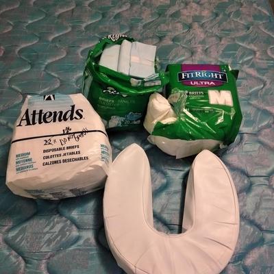 Seat cushion with disposable briefs (opened packages)