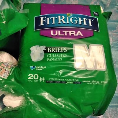 Seat cushion with disposable briefs (opened packages)