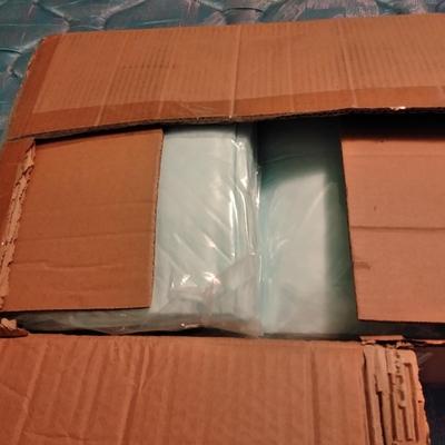 Large open box of Underpads Works great for puppy pads as well