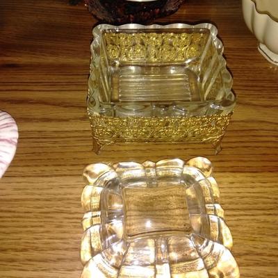 Filigree covered glass jewelry box, porcelain lidded heart dish, and decorative plate.