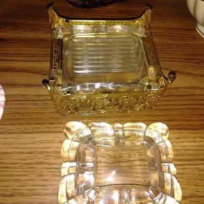 Filigree covered glass jewelry box, porcelain lidded heart dish, and decorative plate.