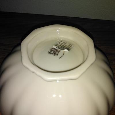 Filigree covered glass jewelry box, porcelain lidded heart dish, and decorative plate.