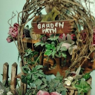 Mirrored Jesus shelf with Honey pot bear, and Garden Faux flower wall hanging