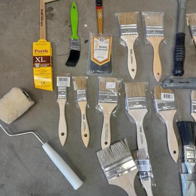 Painter's plastic and SO MANY paint / stain brushes!