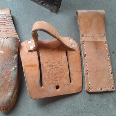 Canvas tool belt and Leather tool belt with saw, hammer, and claw