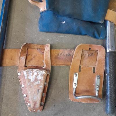Canvas tool belt and Leather tool belt with saw, hammer, and claw
