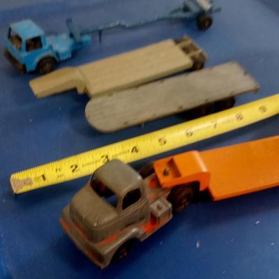 LOT 142 VINTAGE TOY TRUCKS AND TRAILERS