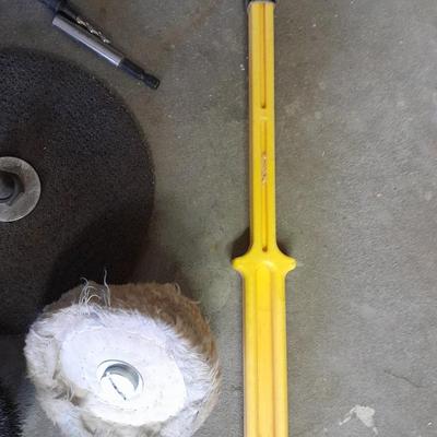 Assortment of wire and buffing wheels, sandpapers, and small tools