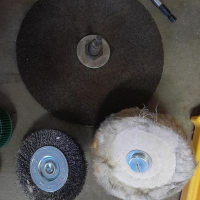 Assortment of wire and buffing wheels, sandpapers, and small tools