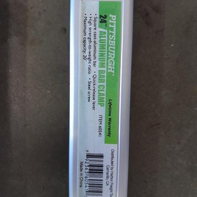 Aluminum bar Clamps, hand saw, level and metal T