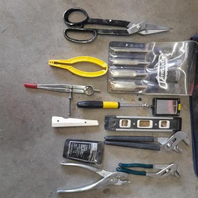 Soft sided Craftsman tool bag with an assortment of tools