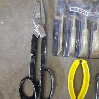 Soft sided Craftsman tool bag with an assortment of tools