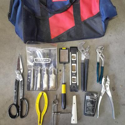 Soft sided Craftsman tool bag with an assortment of tools