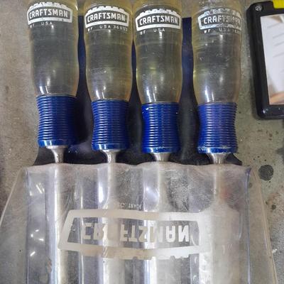 Soft sided Craftsman tool bag with an assortment of tools