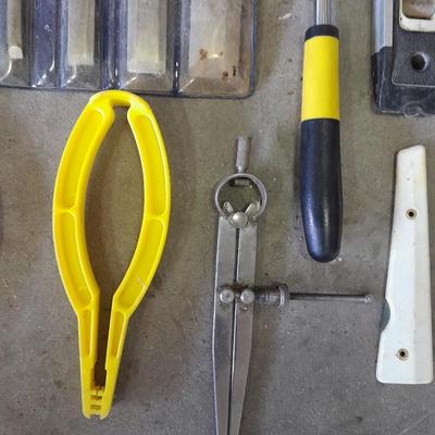 Soft sided Craftsman tool bag with an assortment of tools