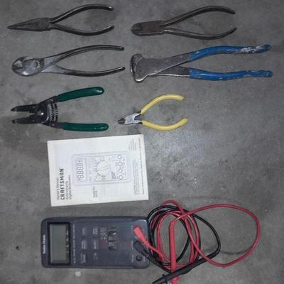 Craftsman multi meter with an assortment of wire snips and cutters