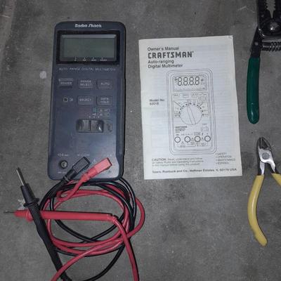 Craftsman multi meter with an assortment of wire snips and cutters