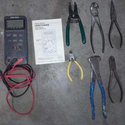 Craftsman multi meter with an assortment of wire snips and cutters