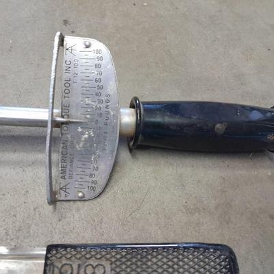 A bunch of different sockets and a torque wrench