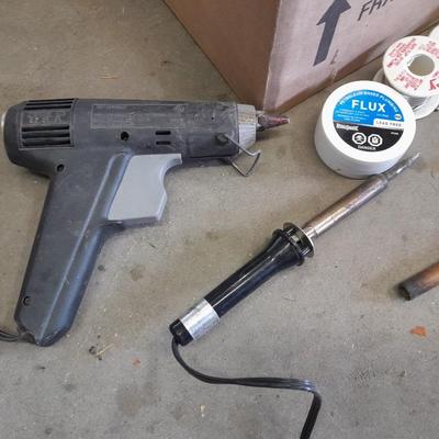 Propane torches, partially full bottles and a glue gun