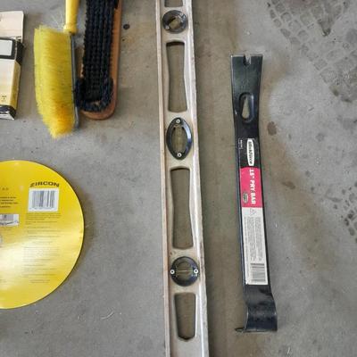 Zircon level, with an assortment of hand tools level, 15" prybar, brushes and more