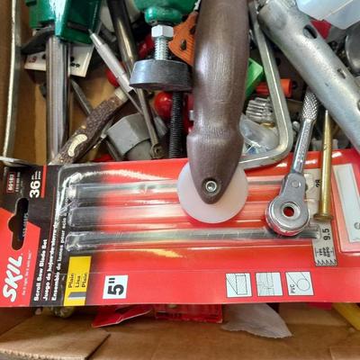 Lots of home repair hardware and small tools