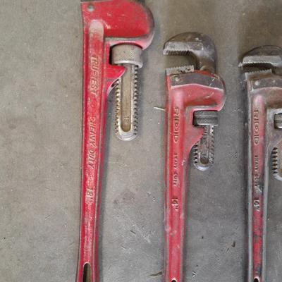 Four pipe wrenches