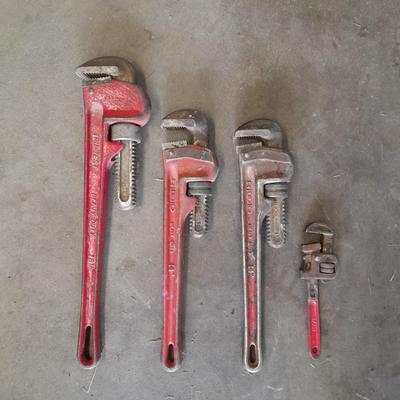 Four pipe wrenches