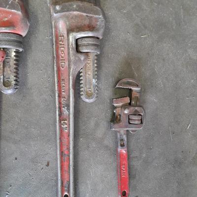 Four pipe wrenches
