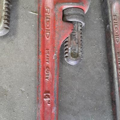 Four pipe wrenches