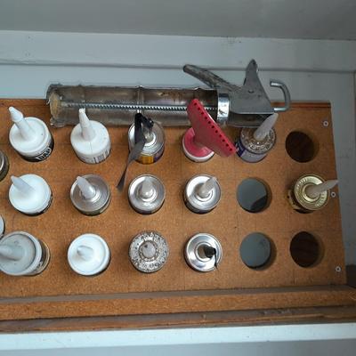 Calking guns and Caulk organizer