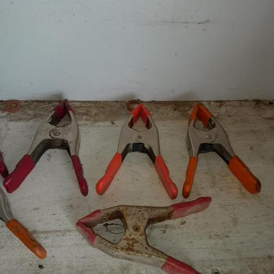 Assortment of hand clamps and a rubber mallet