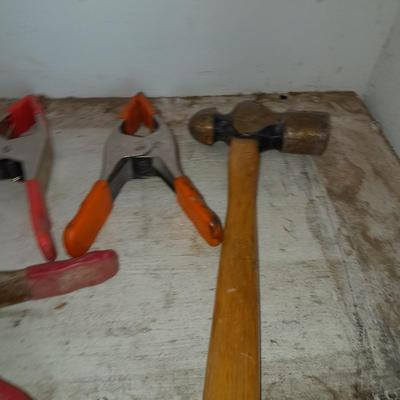 Assortment of hand clamps and a rubber mallet