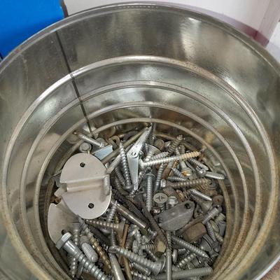 Boxes, and cans full of home hardware - screws- clips- nails etc.