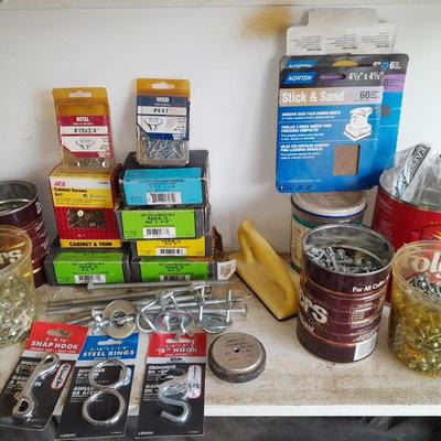 Boxes, and cans full of home hardware - screws- clips- nails etc.