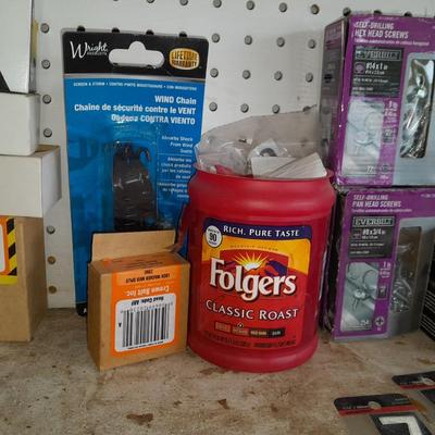 Boxes, and cans full of home hardware - bolts, nuts, nails, and more